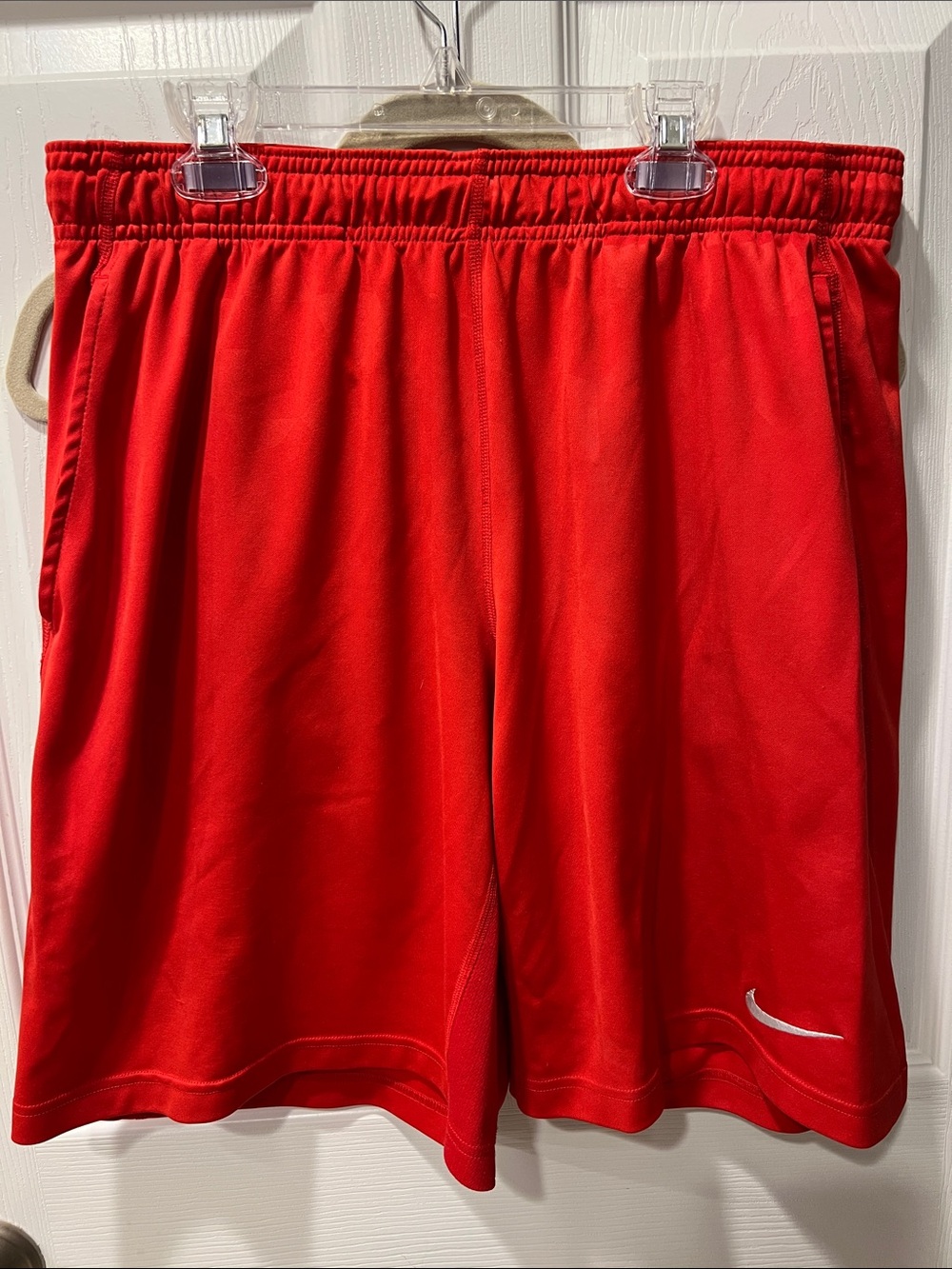 Nike Red Athletic Shorts with Swoosh Accent